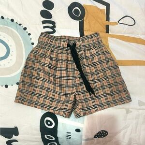 Size 3t Burberry swimming trunks. Great condition